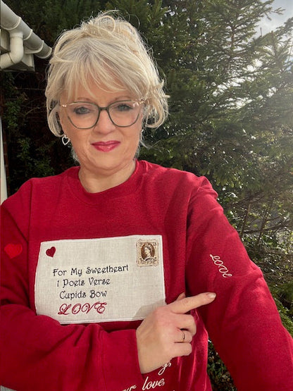 Love Letters red sweatshirt with appliques design of love